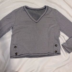 Striped Long Sleeve fits like a medium